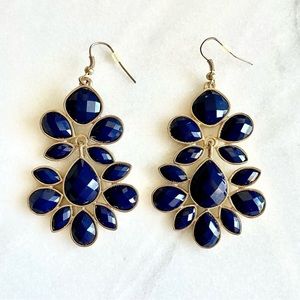 Royal Blue acrylic faceted and gold-tone chandelier raindrop earrings.